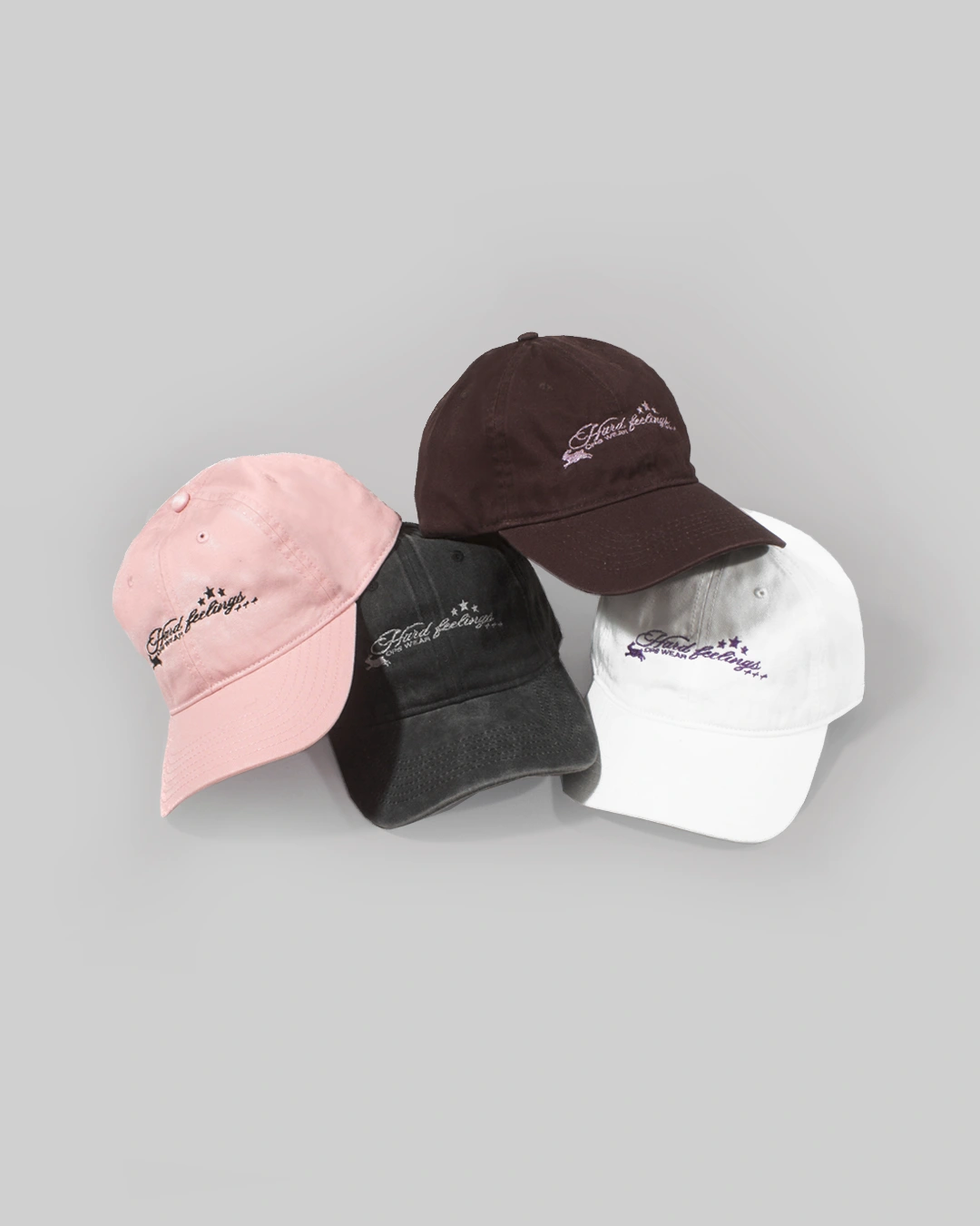 composición gorras polo en rosa, negro washed, marrón, blanco diseño vintage nostálgico